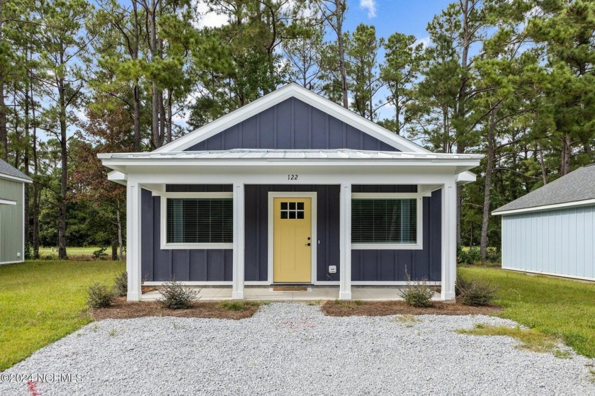 Discover Coastal Elegance at The Cabins at Old Horse a new small - Beach Condo for sale in Stella, North Carolina on Beachhouse.com