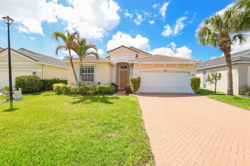 Beautiful home in Lake Forest at St Lucie West with lovely Lake - Beach Home for sale in Port Saint Lucie, Florida on Beachhouse.com
