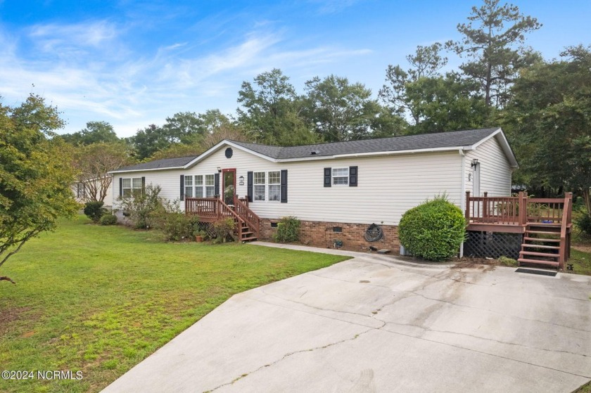 Discover coastal living at its finest in this charming 1,900 sq - Beach Home for sale in Wilmington, North Carolina on Beachhouse.com