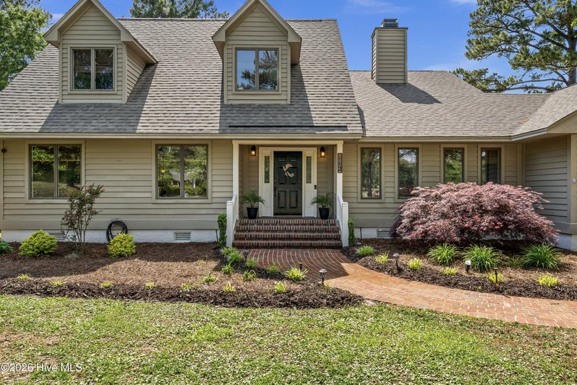 Tucked away on a generous half-acre lot in the Olde Point - Beach Home for sale in Hampstead, North Carolina on Beachhouse.com