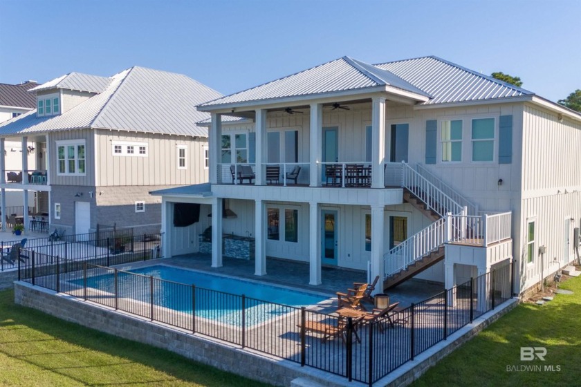 Discover bayfront living in this 7 bedroom, 7 bathroom home in - Beach Home for sale in Orange Beach, Alabama on Beachhouse.com