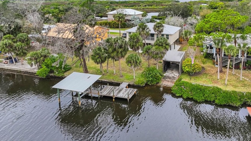 WATERFRONT 2-bed/2-bath home with private BOATHOUSE & RAMP - Beach Home for sale in Ruskin, Florida on Beachhouse.com