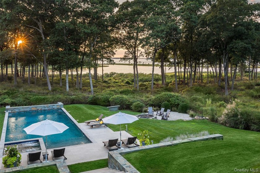 Set on the tranquil shores of Genet Creek, this modern - Beach Home for sale in Sag Harbor, New York on Beachhouse.com