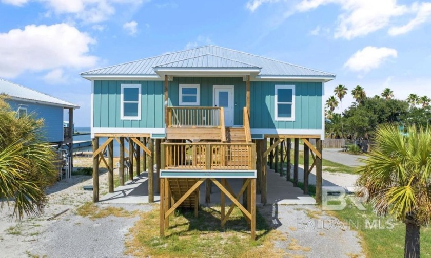 Experience coastal living at its finest with this stunning newly - Beach Home for sale in Gulf Shores, Alabama on Beachhouse.com