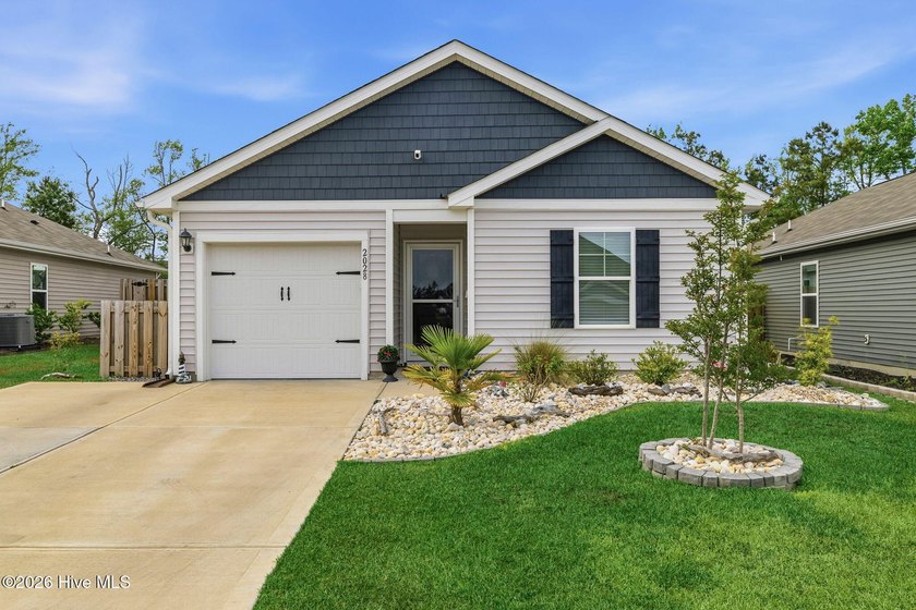 Not your average neighborhood home! Located in the highly sought - Beach Home for sale in Surf City, North Carolina on Beachhouse.com