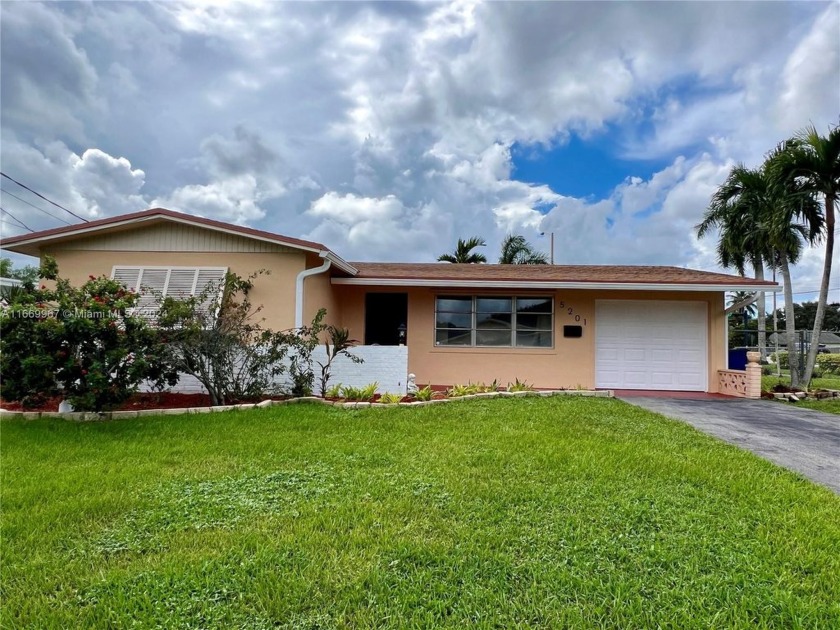 Charming 3-bedroom, 2-bath single-family home in the desirable - Beach Home for sale in Cooper City, Florida on Beachhouse.com