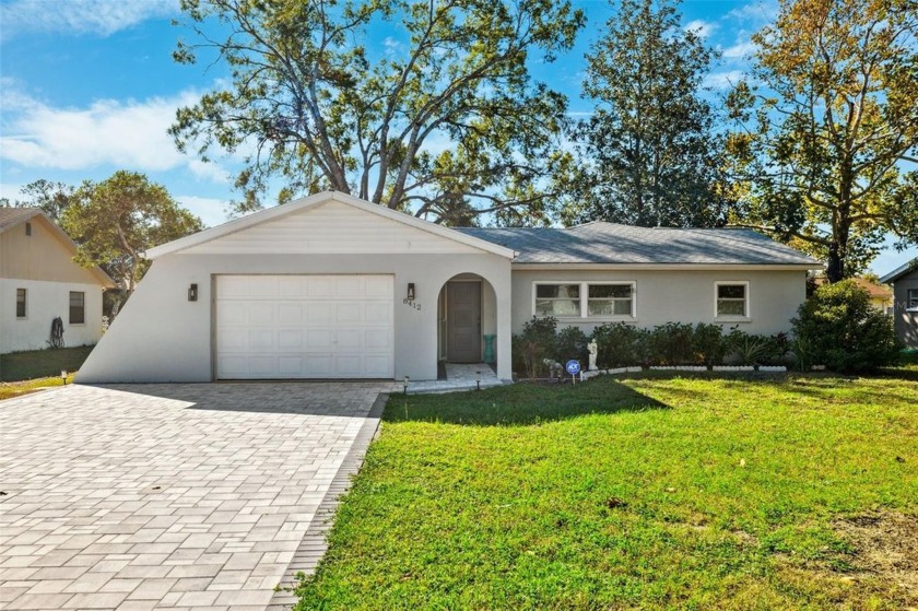 Discover this stunning 3-bedroom, 2-bathroom home with a 2-car - Beach Home for sale in Weeki Wachee, Florida on Beachhouse.com