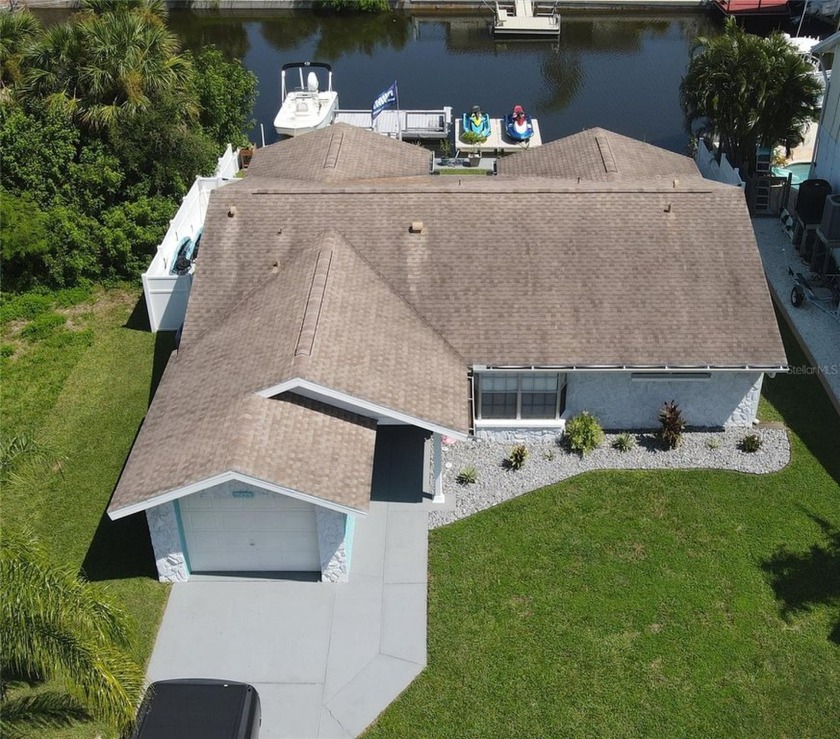 Handyman special! Waterfront 2-bedroom, 2 full bath home with 1 - Beach Home for sale in Hudson, Florida on Beachhouse.com