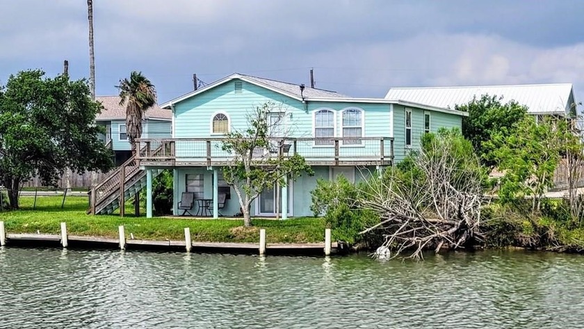 Your Coastal Getaway Awaits! Tucked just off Copano Bay with - Beach Home for sale in Rockport, Texas on Beachhouse.com