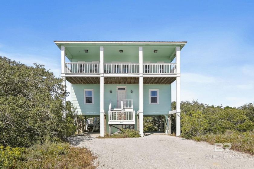 This coastal, beach house is tucked away down Fort Morgan in the - Beach Home for sale in Gulf Shores, Alabama on Beachhouse.com