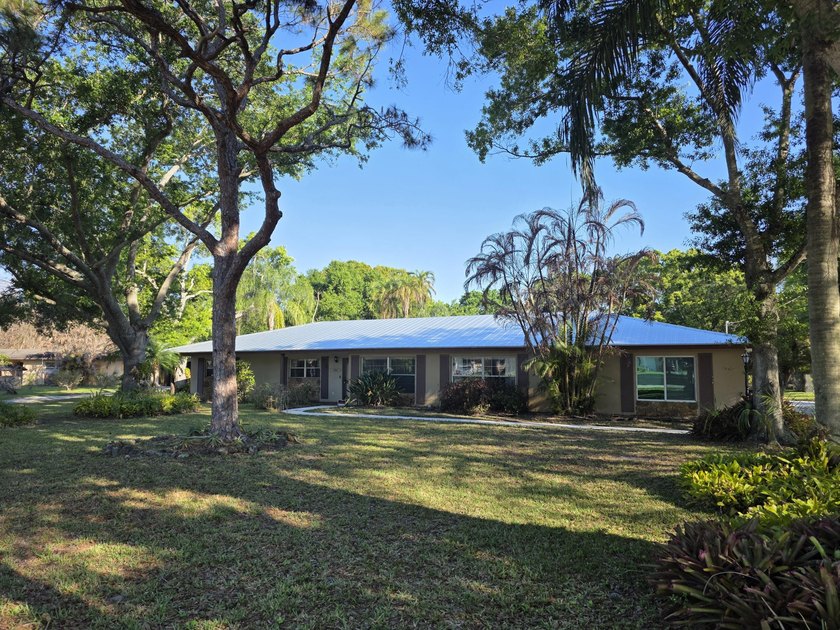 3 BEDROOM, 2 BATH HOME WITH A POOL ON .97 ACRES WITH A NEW ROOF - Beach Home for sale in Fort Pierce, Florida on Beachhouse.com