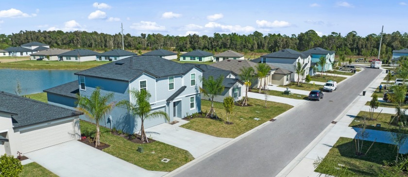 This new two-story home is a comfortable haven. The first floor - Beach Home for sale in Lehigh Acres, Florida on Beachhouse.com