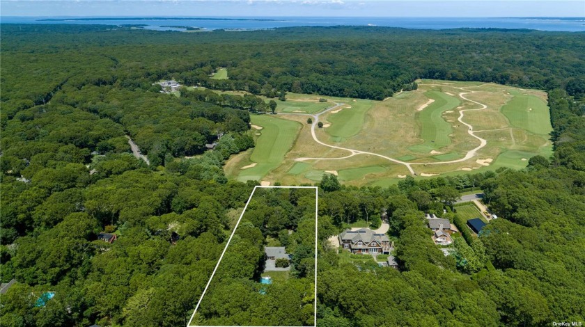 Experience unparalleled privacy on this exquisite +/- .83-acre - Beach Home for sale in East Hampton, New York on Beachhouse.com