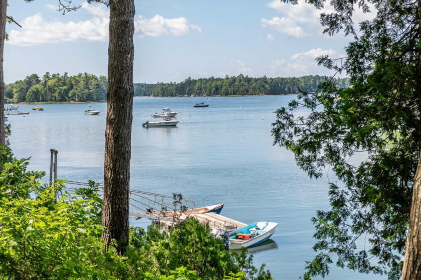 Situated on a private and quiet wooded lot, this Saltbox style - Beach Home for sale in Harpswell, Maine on Beachhouse.com