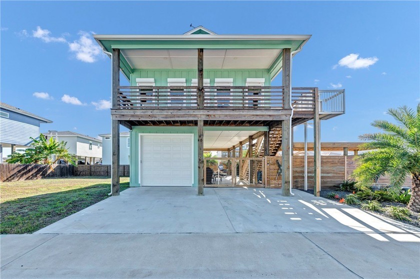This 4-bedroom, 3-bathroom home is just a short golf cart ride - Beach Home for sale in Port Aransas, Texas on Beachhouse.com