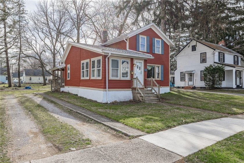 Welcome to 73 Pollard Ave in Charlotte near the Lake ** Cute - Beach Home for sale in Rochester, New York on Beachhouse.com