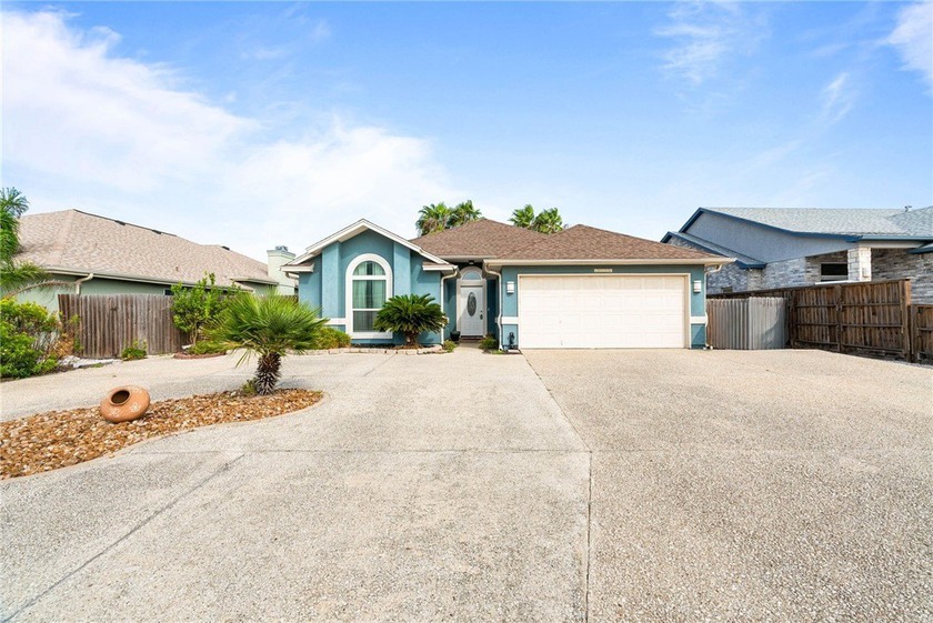 YOUR COASTAL RETREAT AWAITS! This stunning waterfront stucco - Beach Home for sale in Corpus Christi, Texas on Beachhouse.com