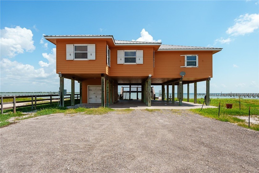 This warm and inviting waterfront retreat offers the perfect - Beach Home for sale in Taft, Texas on Beachhouse.com