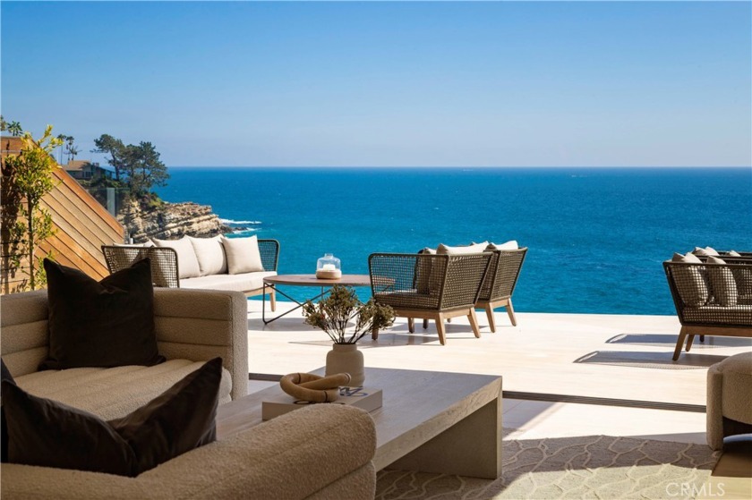 Set on the oceanfront in the gated and private community of - Beach Home for sale in Laguna Beach, California on Beachhouse.com