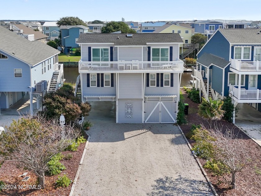 Canal-front home on Sunset Beach, NC, featuring 4 beds, 2 baths - Beach Home for sale in Sunset Beach, North Carolina on Beachhouse.com