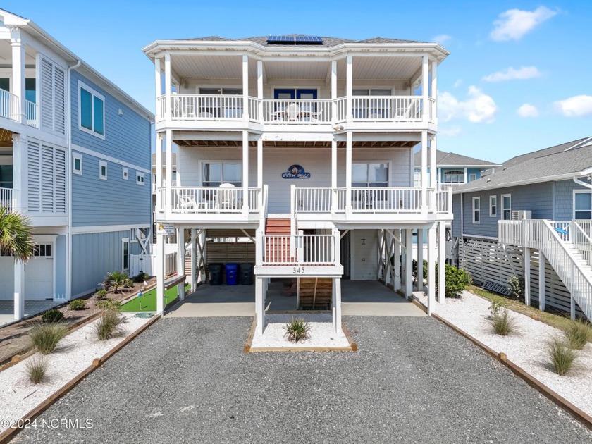 Experience the ultimate coastal lifestyle in this fully - Beach Home for sale in Ocean Isle Beach, North Carolina on Beachhouse.com