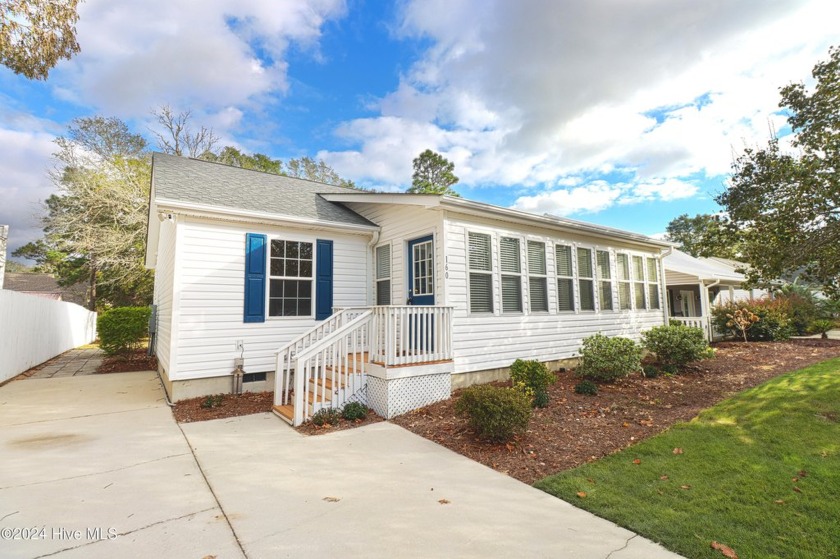 Welcome to your dream coastal getaway! This stunningly renovated - Beach Home for sale in Oak Island, North Carolina on Beachhouse.com