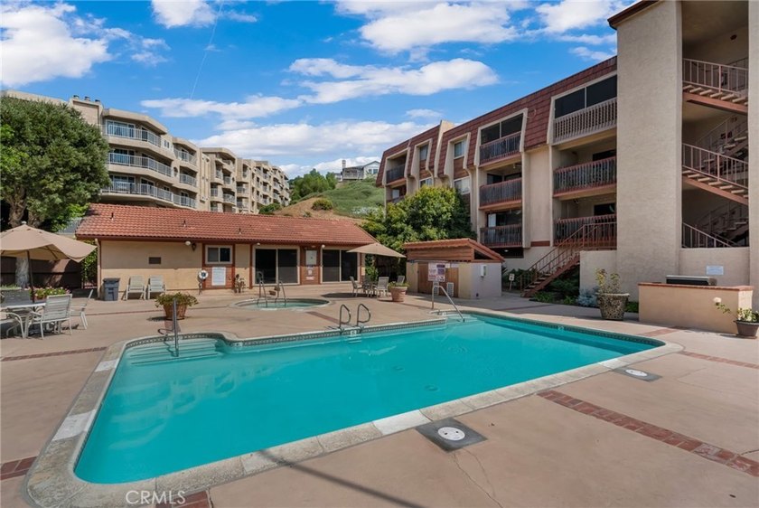 Resort-style living in the highly sought-after community of - Beach Condo for sale in Signal Hill, California on Beachhouse.com