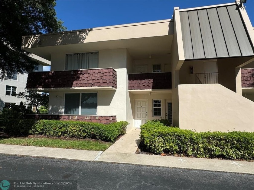 Seller's EV ELECTRIC CHARGER installed in front of unit. New - Beach Condo for sale in Pompano Beach, Florida on Beachhouse.com