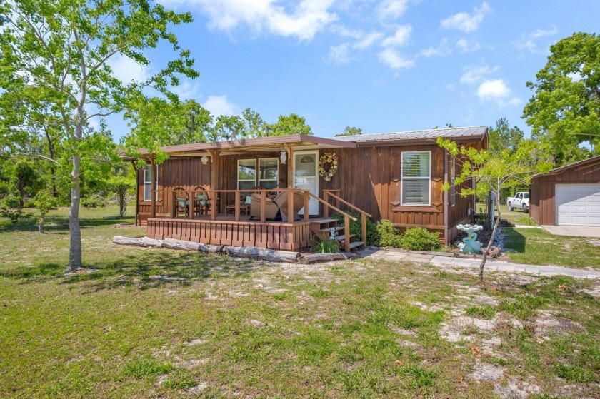 Coastal cabin on a serene 1-acre lot just moments away from the - Beach Home for sale in Perry, Florida on Beachhouse.com