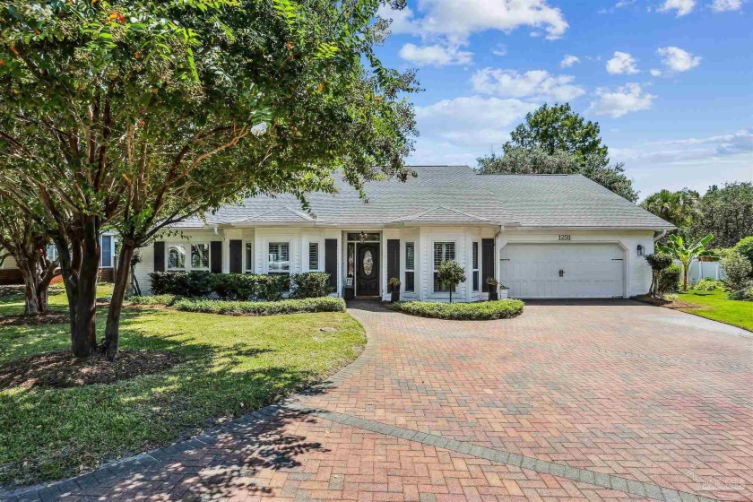 Beautifully updated and meticulously maintained lake front home - Beach Home for sale in Gulf Breeze, Florida on Beachhouse.com