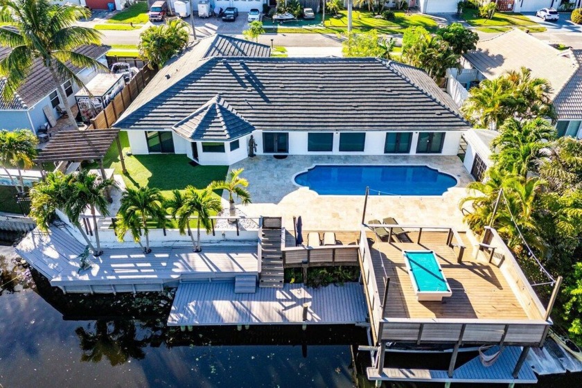 Discover this beautifully remodeled contemporary waterfront home - Beach Home for sale in Boynton Beach, Florida on Beachhouse.com
