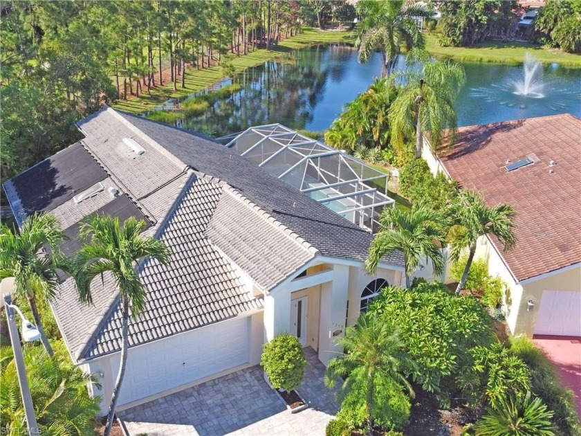 JUST REDUCED! Originally built and showcased as the community's - Beach Home for sale in Naples, Florida on Beachhouse.com