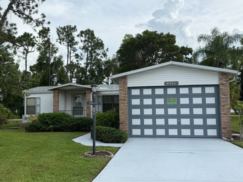 This lovely, manufactured home on leased land in a gated and age - Beach Home for sale in North Fort Myers, Florida on Beachhouse.com