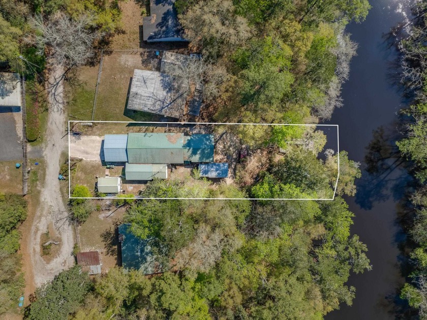 Explore a sanctuary away from the hustle and bustle of city - Beach Home for sale in Sopchoppy, Florida on Beachhouse.com