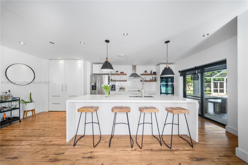 Escape to your own private waterfront paradise! This beautifully - Beach Home for sale in Palmetto Bay, Florida on Beachhouse.com