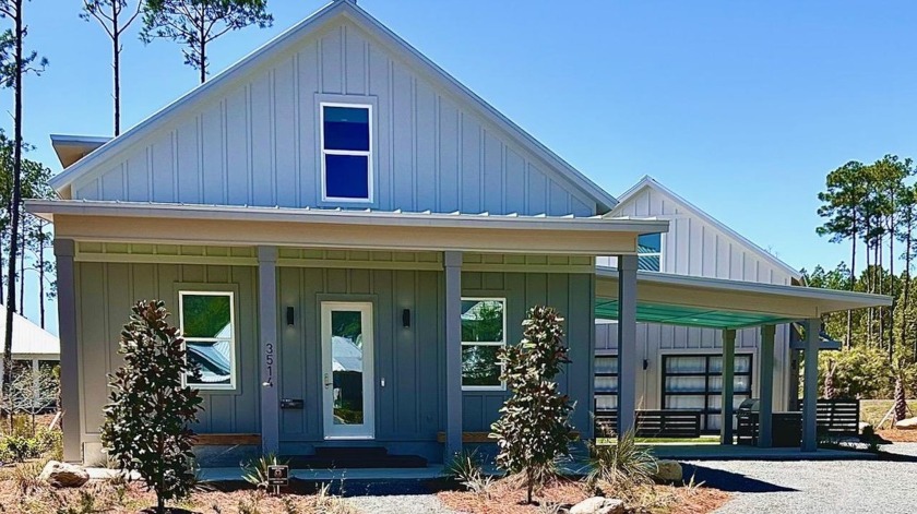 This beautiful, new construction home is a must see!! It's - Beach Home for sale in Sopchoppy, Florida on Beachhouse.com