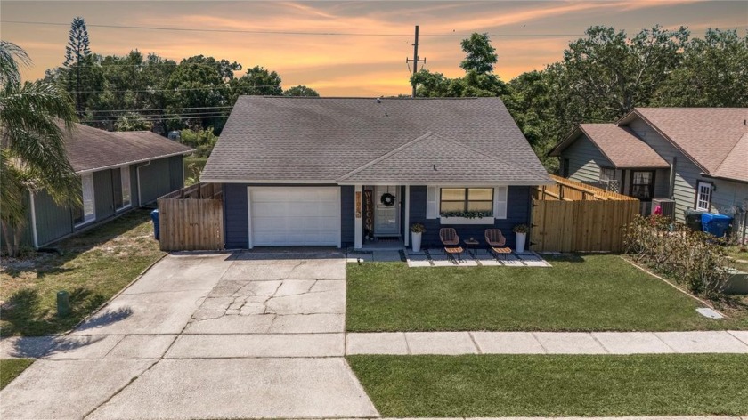 Welcome to this adorable 3-bedroom, 2-bathroom home with a 1-car - Beach Home for sale in Largo, Florida on Beachhouse.com