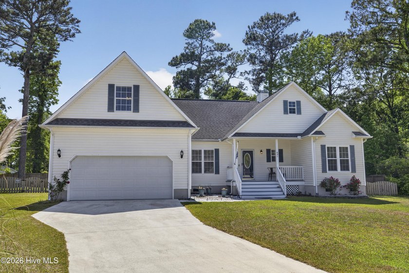 A rocking chair front porch welcomes you home to 421 Celtic Ash - Beach Home for sale in Sneads Ferry, North Carolina on Beachhouse.com