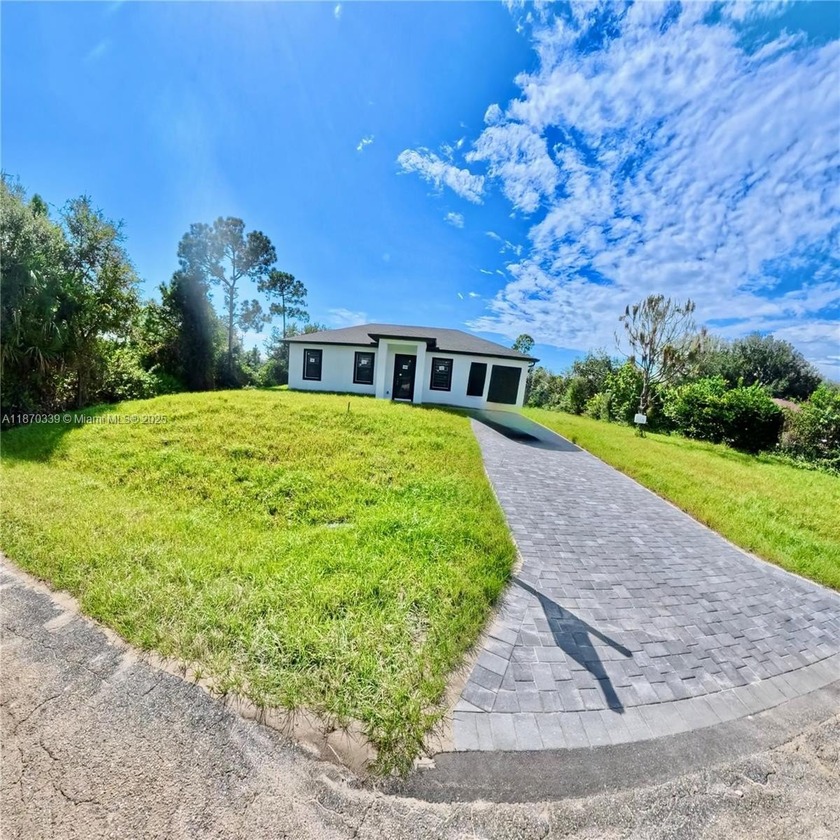 BRAND-NEW CONSTRUCTION ON HALF AN ACRE LOT !!! This stunning - Beach Home for sale in Lehigh Acres, Florida on Beachhouse.com