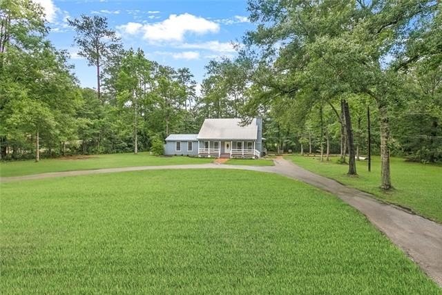 This stunning Southern Acadian-style home is truly a gem - Beach Home for sale in Mandeville, Louisiana on Beachhouse.com