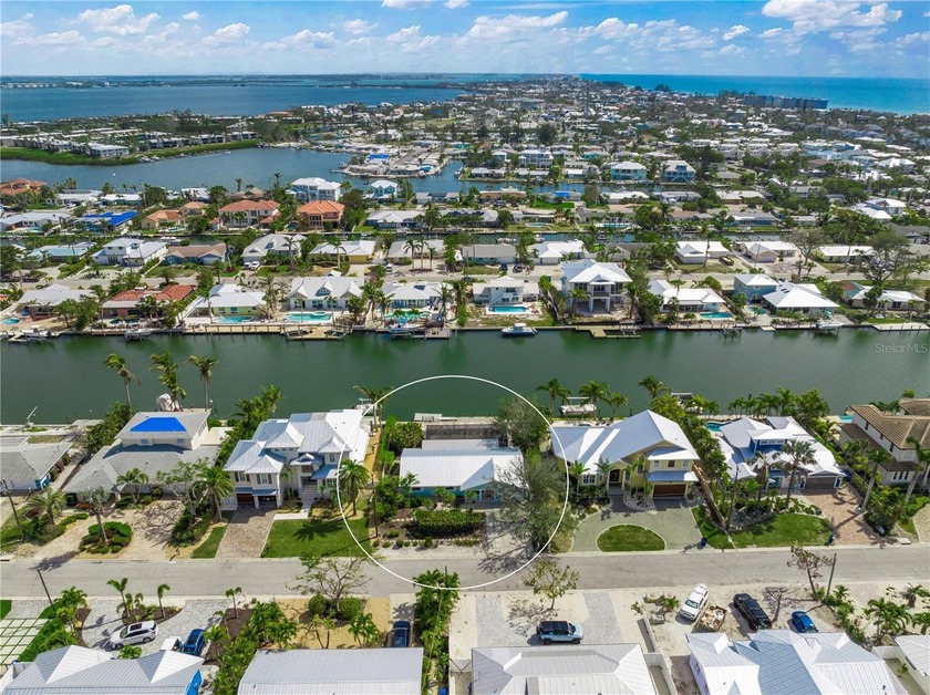 This stunning waterfront home boasts approximately 80' of water - Beach Home for sale in Holmes Beach, Florida on Beachhouse.com