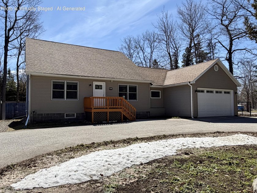 Beautifully remodeled Mackinaw City home just a short walk to - Beach Home for sale in Mackinaw City, Michigan on Beachhouse.com