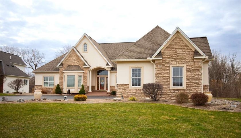 Welcome to this bright, beautiful contemporary ranch, located on - Beach Home for sale in Rochester, New York on Beachhouse.com
