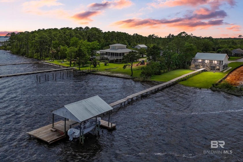 Welcome to your fully furnished waterfront oasis nestled along - Beach Home for sale in Lillian, Alabama on Beachhouse.com