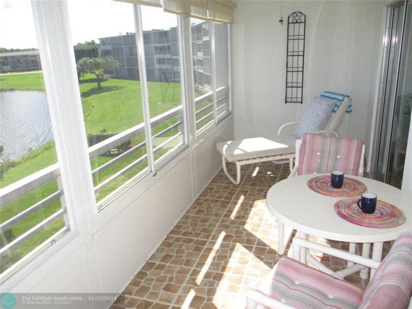 Enjoy serene lake views from this inviting 2-bedroom, 1 - Beach Condo for sale in Boca Raton, Florida on Beachhouse.com