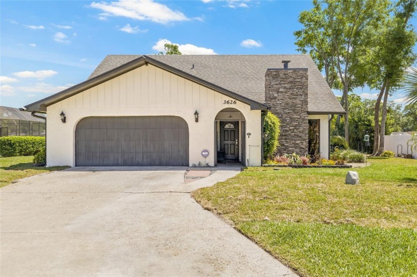 Lakefront Living in Lake Padgett Estates! Welcome to your dream - Beach Home for sale in Land O Lakes, Florida on Beachhouse.com