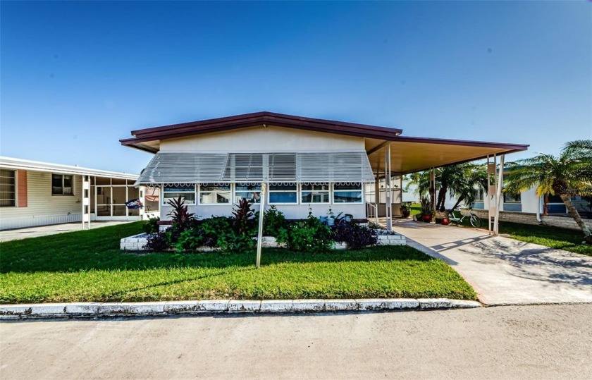 Welcome to your dream home at 2022 Manoa Dr, this 2-bedroom 2 - Beach Home for sale in Holiday, Florida on Beachhouse.com