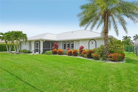 This beautiful Gulf access canal home in the sought-after - Beach Home for sale in Cape Coral, Florida on Beachhouse.com