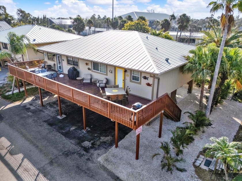 Elevated and fully updated coastal retreat on beautiful Anna - Beach Home for sale in Holmes Beach, Florida on Beachhouse.com