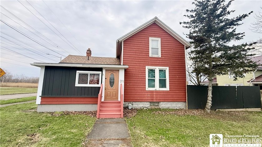 Welcome to this charming corner-lot home in Dunkirk, perfectly - Beach Home for sale in Dunkirk, New York on Beachhouse.com